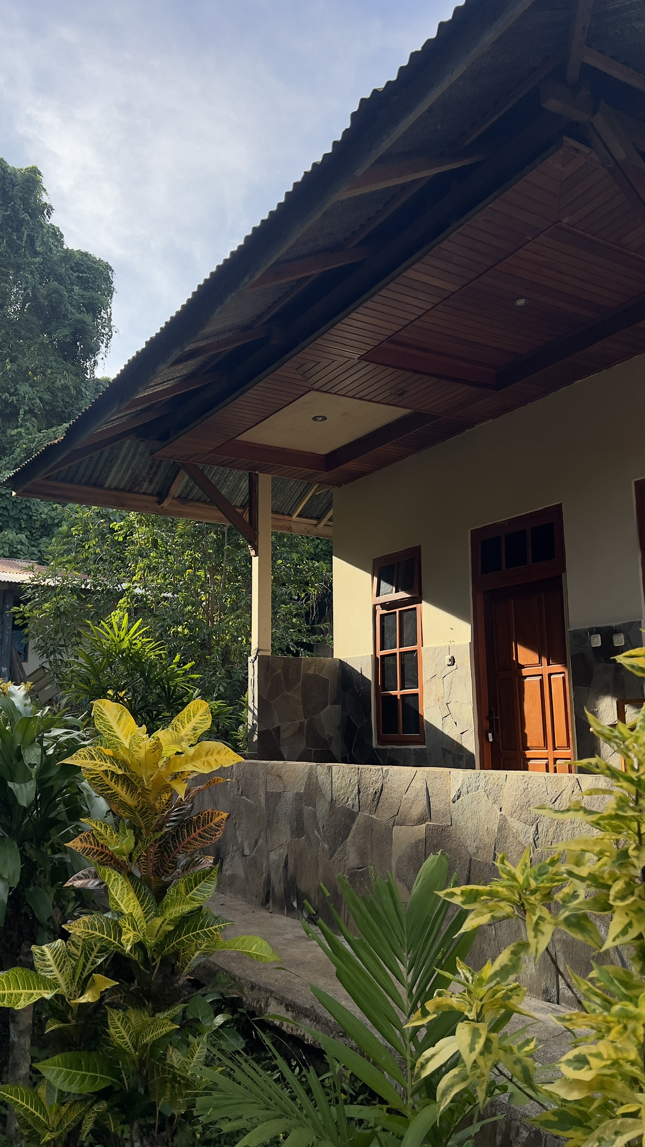 Deluxe Suite at Bunaken Sunrise Resort — Comfortable suite in our resort with essential amenities.